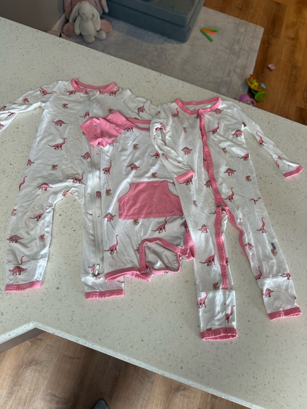 Kyte BABY White and Pink Dinosaur Print One-Piece Bodysuits